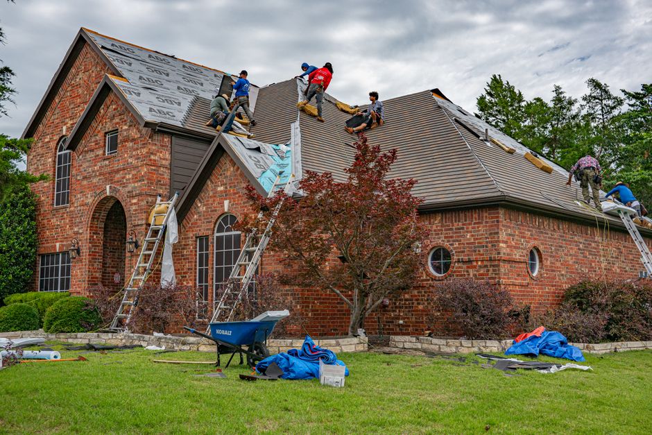 Roofer working on a residential roof